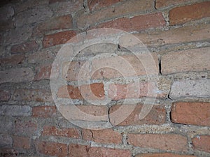 Old red brick wall background in thailand