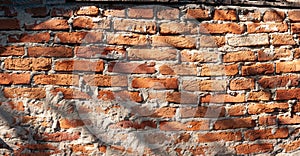Old red brick wall background. Wide panoramic view of masonry. Grunge red masonry
