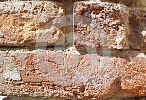 Old red brick wall close-up