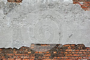 Old Red Brick Wall With Damaged Grey Plaster Background