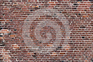 Old Red Brick Wall with Lots of Texture and Color.