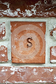 Old red brick wall in vintage style, brickwork background.