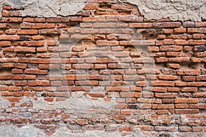 Old red brick wall in the wall of old building.