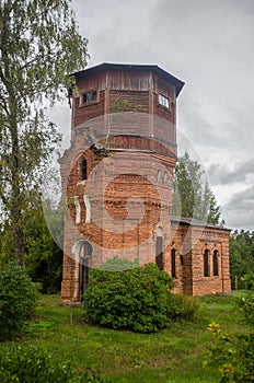 Old red brick and wood water tower, Spare, Latvia