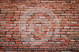 Old red bricks wall for texture background