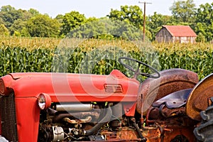 Old red farm tractor