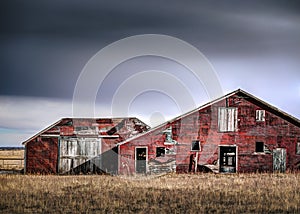 Old Red Farmhouse In The Countryside