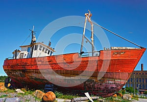 Old red fishing boat in the harbor PeenemÃ¼nde