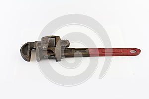 Old red handled pipe wrench