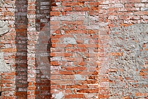 Old red lighter brick wall of La Vang church, bell tower