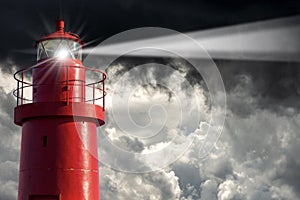 Old Red Lighthouse with Storm Clouds on the Background - Bad weather