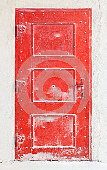 Old red metal door