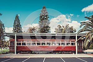 Old red rattler tram in Glenelg on display