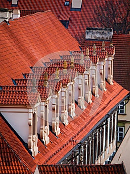 Old red roof with dormer-windows