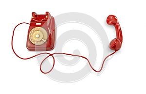 Old red rotating dial telephone