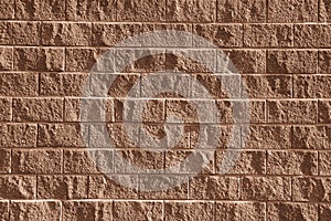 Old red stone wall background texture