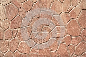 Old red stone wall background texture