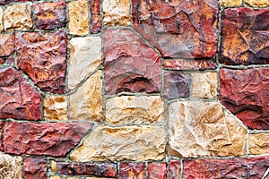 Old red stone wall texture background for design