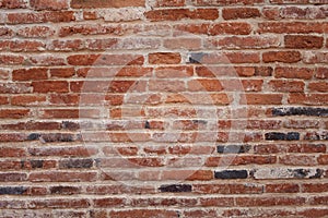 Old red stone wall texture and background