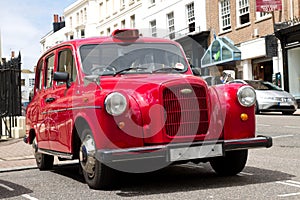 Old red taxi in London