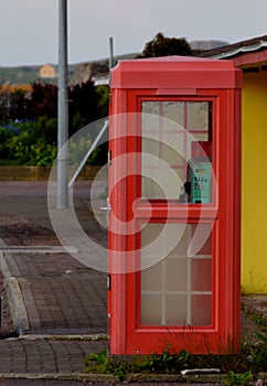 Old red telephone booth