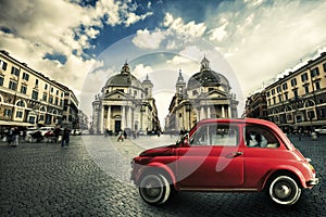 Old red vintage car italian scene in the historic center of Rome. Italy