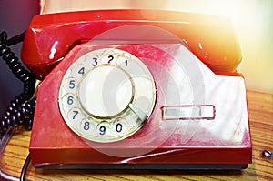 Old red vintage dial telephone