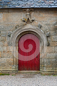 Old red vintage door in church France