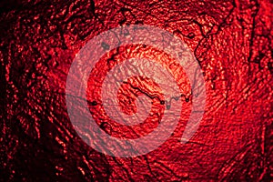 Old textured red wall texture background structure for inscriptions