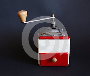 Old red-white coffee grinder