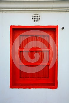 Old red window Thailand temple