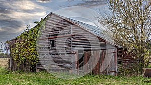 Old red wood barn at twilight