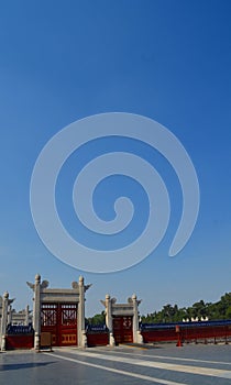 Old red wooden gate in The Temple of Heaven, Beijing, China.