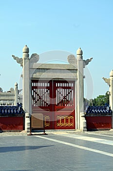 Old red wooden gate in The Temple of Heaven, Beijing, China.