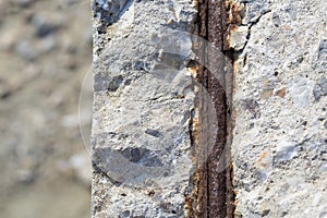 Old reinforced concrete structure with damaged and rusty metallic reinforcement that must be demolished - Metal bars rusty due to