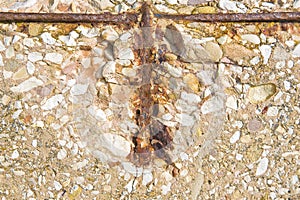 Old reinforced concrete wall without concrete cover protection due oxidation with damaged and rusty metallic reinforcement