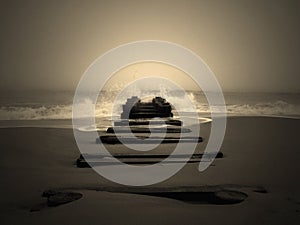 Old remnants of a pier on a Delaware beach photo