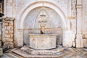 Old renaissance fountain inside old town Dubrovnik.