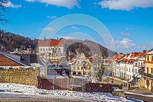 Old renaissance houses and church in Kazimierz Dolny, Poland