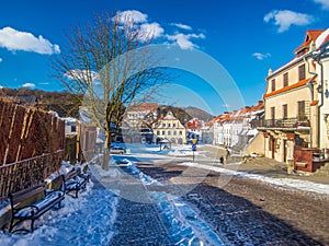 Old renaissance houses and church in Kazimierz Dolny, Poland