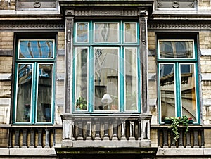 Old but renovated windows in historical part of Bruxelles