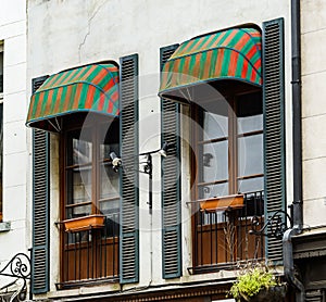 Old but renovated windows in historical part of Bruxelles