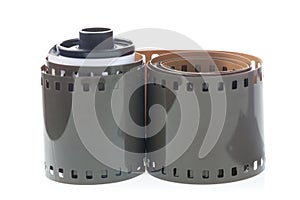 Old retro 35 mm film reel isolated on white background