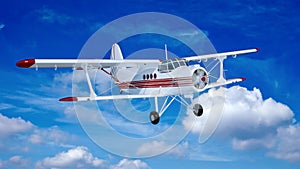 Old retro bi plane fly in the clouds.