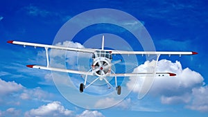 Old retro bi plane fly in the clouds.