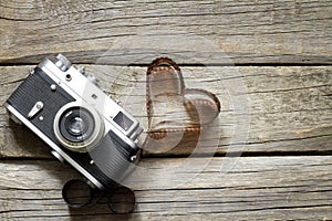 Old retro camera with heart love photography concept