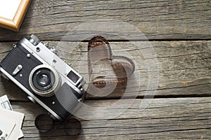 Old retro camera with heart love photography concept