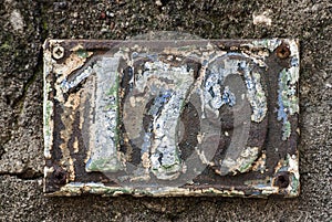 Old retro cast iron plate number 179