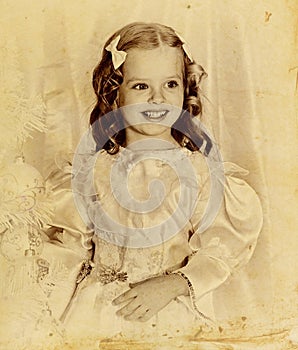 Old retro Christmas portrait of child girl.