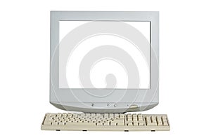 Old retro CRT monitor display with blank white screen and a keyboard isolated on white background